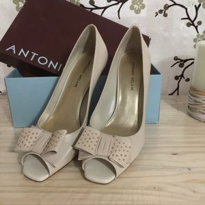 Antonio Melani open toe pumps.